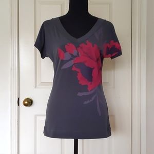 NWT. The Limited Short Sleeve Top with front painted flowers and back design.